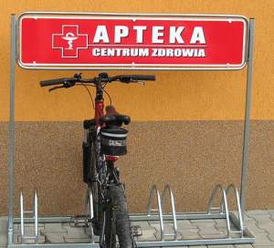 Stojak na rowery Toscana - 4 stanowiska - z konstrukcją reklamową